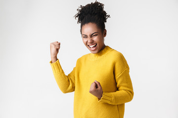 Image closeup of cheerful african american woman smiling at camera with her eyes closed
