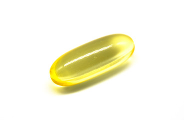 Close up of oil filled capsule (soft gel) suitable for presenting food supplements: fish oil, omega 3, omega 6, omega 9, vitamin A, vitamin D, vitamin D3, vitamin E, evening primrose oil, borage oil