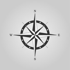 Compass rose, wind rose, navigation icon isolated on gray background. Vector illustration, flat design.