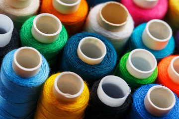 Colorful spools of sewing thread. Colored thread for sewing