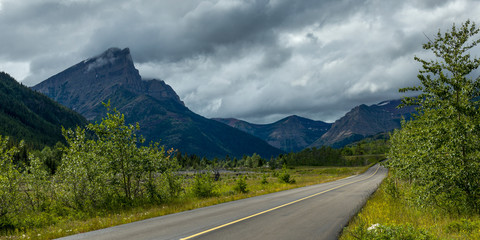 Road leading towards mountain, Red Rock Canyon Parkway, Waterton Lakes National Park, Alberta, Canada