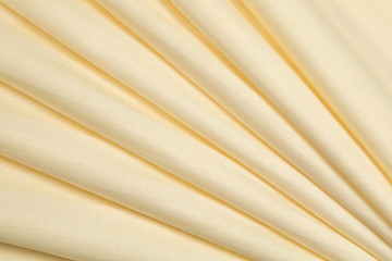 Cotton fabric structural with development by a strip of yellow color. Fabric is put by accurate...