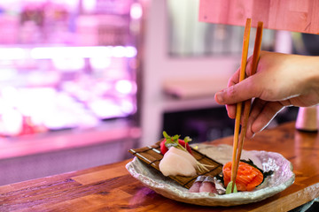 preparing delicious japanese food with fish