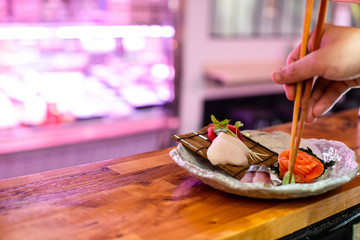 preparing delicious japanese food with fish