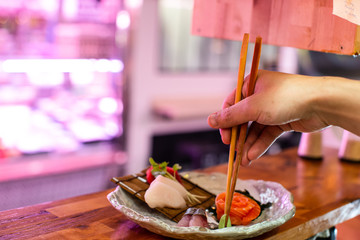 preparing delicious japanese food with fish