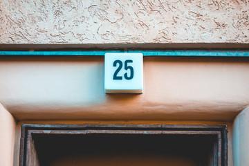 door sign with number 25 on the top