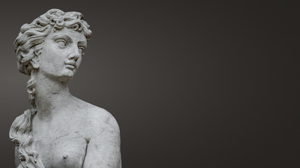 Fototapeta na wymiar Statue of ancient sensual naked Renaissance Era woman in Potsdam at smooth gradient background, Germany