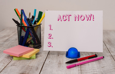 Writing note showing Act Now. Business concept for do not hesitate and start working or doing stuff...