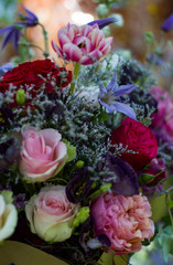 bouquet of different flowers and pink roses