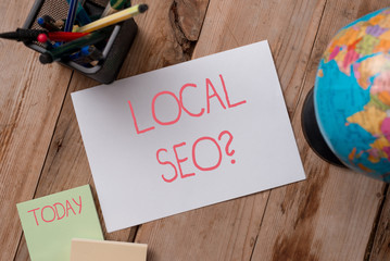 Writing note showing Local Seoquestion. Business concept for incredibly effective way to market...