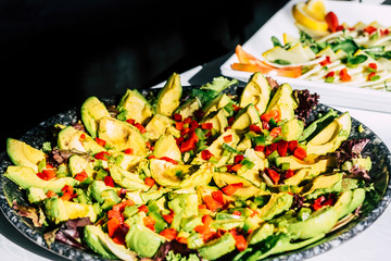 Catering and buffet restaurant concept with tasty delicious vegetables on the place ready to be served at guests or clients - vegetarian healthy food