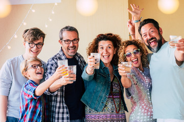 Group of people caucasian men and women different ages from children to teenager to adults enjoy...