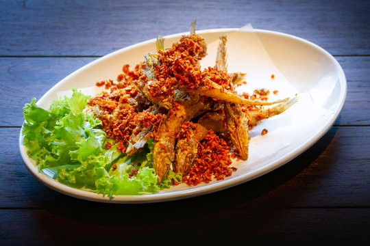 seafood - golden brown deep fried fish with tamaric - halal food