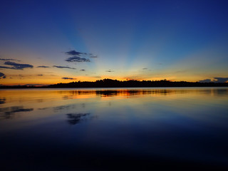 Fototapeta na wymiar Sunset over an Amazonian lagoon