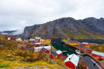 Naklejka premium View to town Nusfjord with Mountains on side