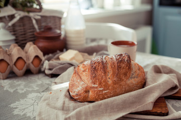 Baking ingredients placed on wooden table, ready for cooking. Concept of food preparation, Making bread at home, kitchen on background.