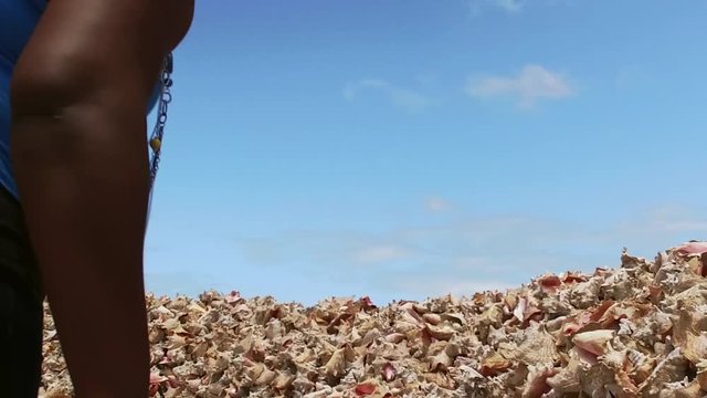 The Original Bahama Mama Holding Conch Shell, Conch Shell Palace,  West End Grand Bahama, Bahamas