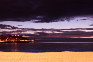 Obraz premium sunset on the beach of La coruna, spain