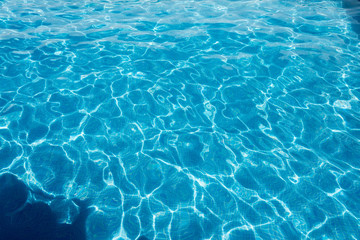 Fototapeta na wymiar Reflections in the water of a pool.