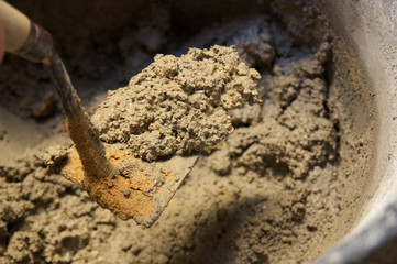 Fototapeta premium Close-up of a palette full of masonry paste
