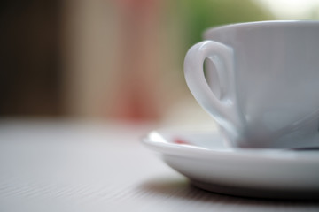 Close-up of the handle of a porcelain cup