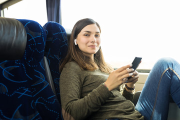 Listening To Music On Her Bus Trip