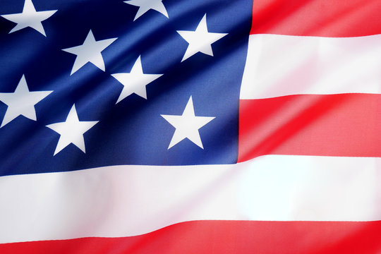 Background of wave flag of the United States of America.