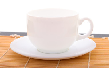 Сup on saucer isolated.