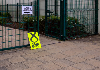 Signs outside a polling station during the EU parliament election in Scotland in May 2019