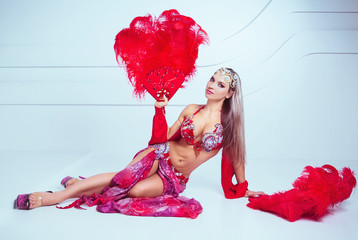  woman wearing a stage costume of a  carnival  dancer