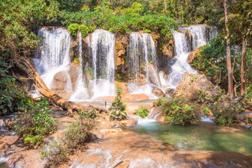 Obraz premium Beautiful turquoise waterfalls in the middle of the jungle of Chiapas in Mexico