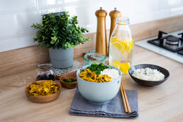 Rice with chicken curry and broccoli