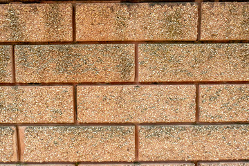 Fototapeta premium rough brick wall at a house
