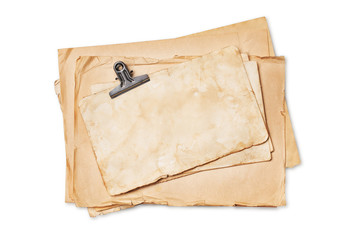 Mockup of empty old vintage yellowed paper with binder clip
