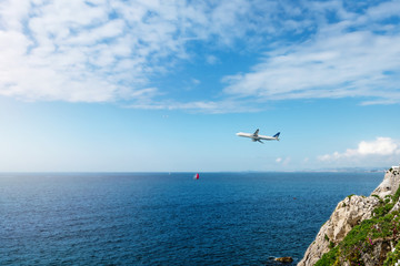 Fototapeta na wymiar plane flying over the mediterranean sea