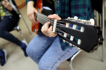 man playing guitar