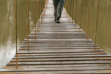 the way over the hanging bridge over the spring river