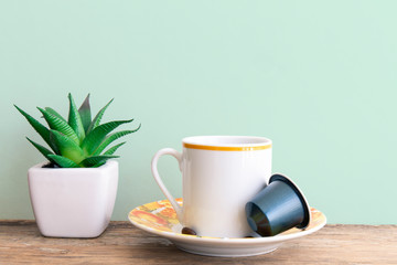 Expresso cup with a coffee capsule