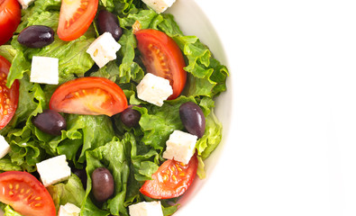 Greek Salad with Olives Tomatos and Feta Cheese Isolated on a White Background