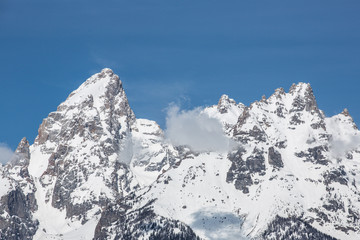 Snowcapped Grand Teton Peak (correct name is 'Hayden Peak') can be seen from almost anywhere in Grand Teton National Park. Taken in mid-May during the afternoon.