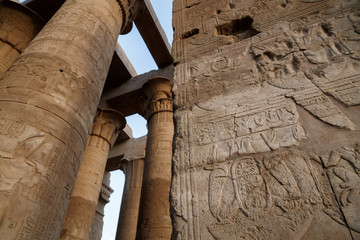 Close view to hieroglyphs wall of Temple of Kom Ombo, Egypt. The temple complex Kom Ombo includes many ancient monuments and columns of the ancient Egyptian civilization