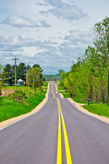 Fototapeta na wymiar American in Spring - Rural Highway.