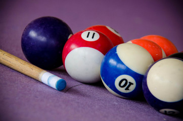 pool table with balls. billiard table, balls, cue. close-up