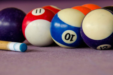 pool table with balls. billiard table, balls, cue. close-up