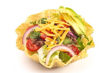 Taco Salad in a Crunch Corn Tortilla Bowl on a White Background