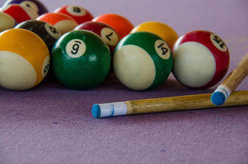 pool table with balls. billiard table, balls, cue. close-up