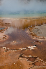 Colorful chemicals of the Grand Prismatic Spring in Yellowstone National Park, Wyoming. Taken during the afternoon in mid-May.