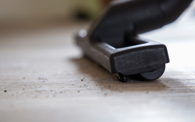 beautiful girl doing wet cleaning and vacuuming