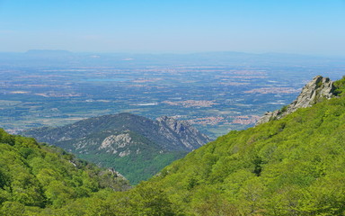 Fototapeta na wymiar France landscape of the Roussillon plain seen from the mountains of the Massif des Alberes, Pyrenees Orientales