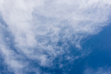 bright blue sky with clouds, abstraction